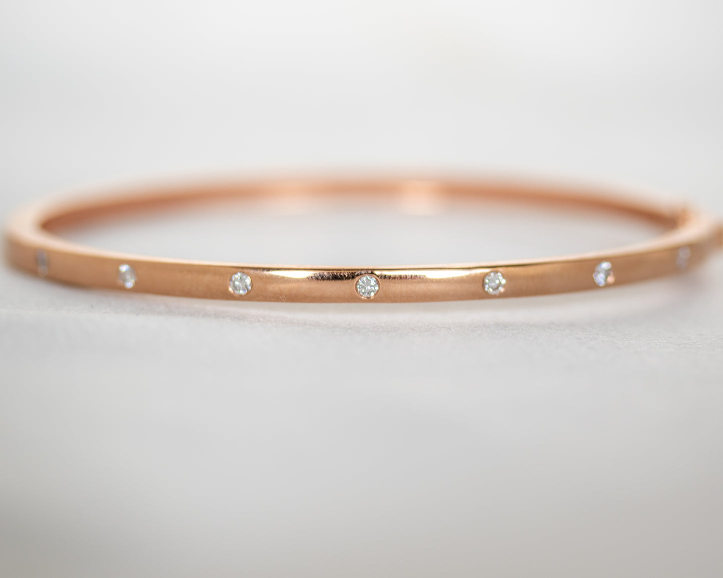 14K gold flush-set diamond bangle, top view