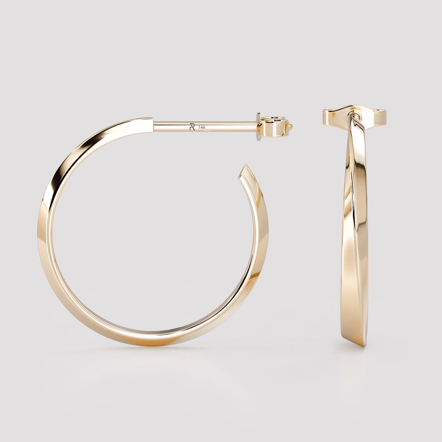 14K gold geometric hoop earrings from the Twist collection, minimalist modern fine jewelry with sleek polished finish and sculptural design.