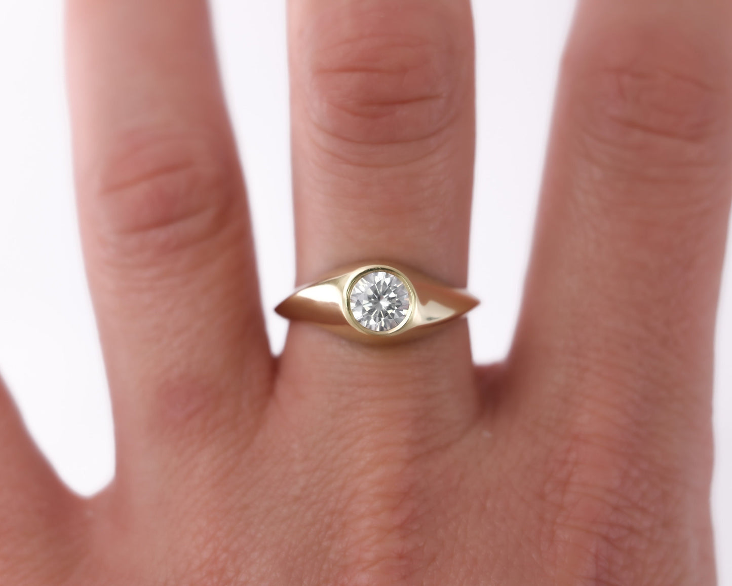 14K yellow gold modern signet ring with round brilliant diamond in a sleek bezel setting, minimalist unisex design handcrafted for everyday elegance
