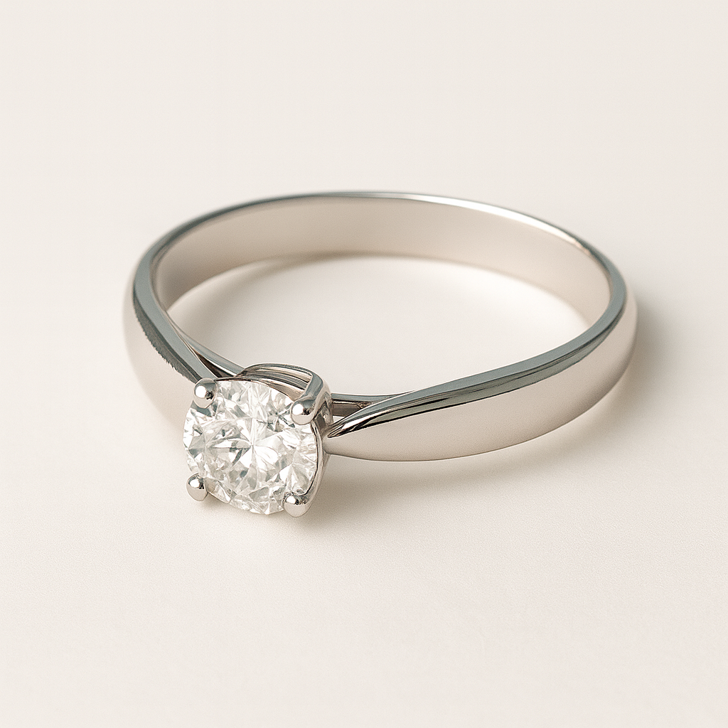 white gold ring with a diamond on a light gray background