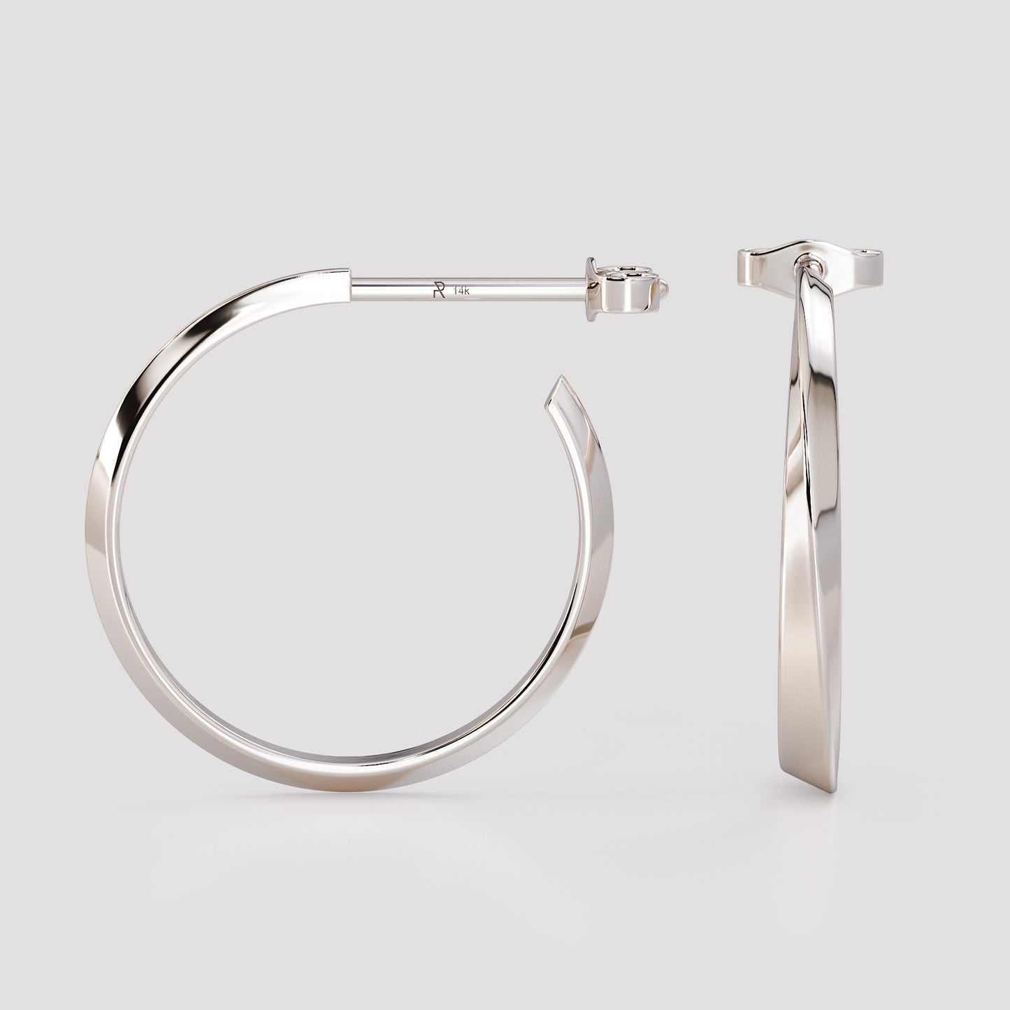 Side and front view of 14K white gold twist hoop earrings, modern geometric sculpted design from the Twist collection, minimalist fine jewelry on light gray background.