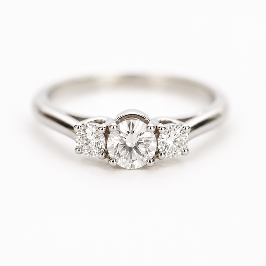 Three stone diamond engagement ring in 14K white gold, round cut center stone