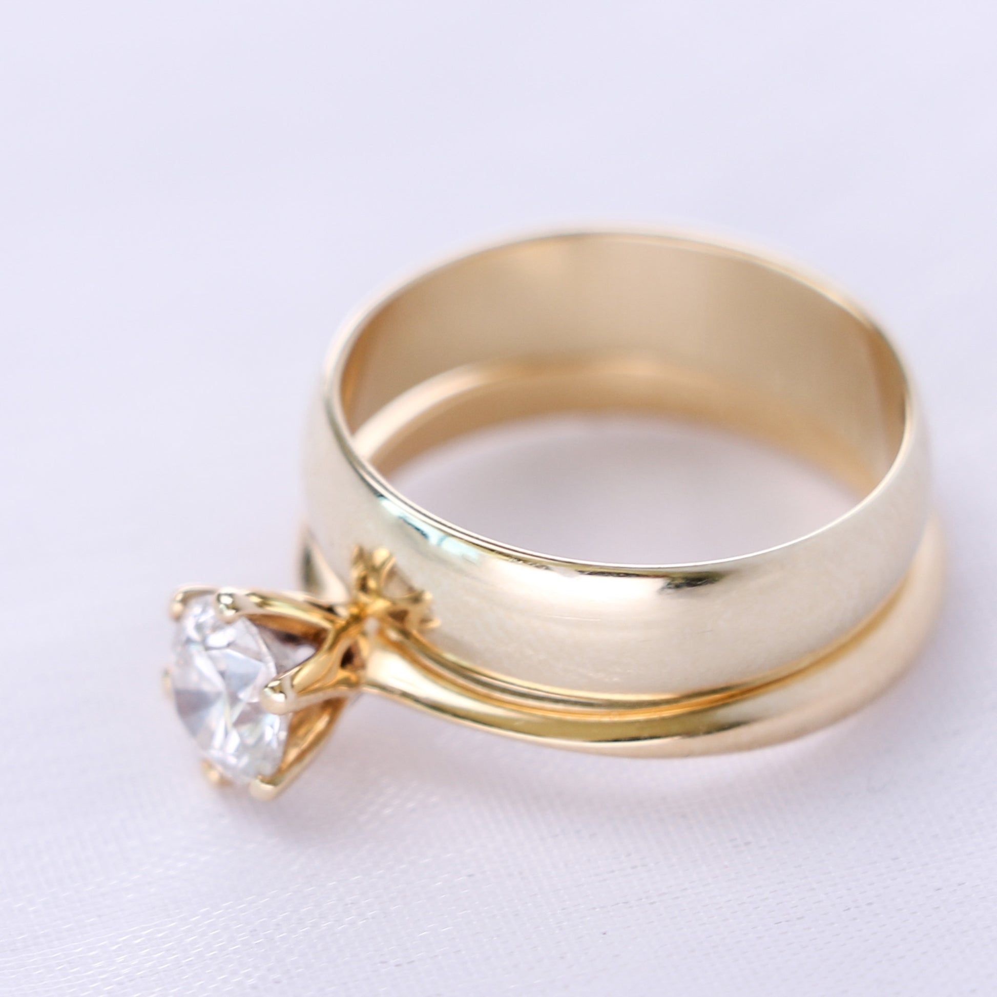 yellow gold ring set of engagement and wedding ring stacked and facing off side
