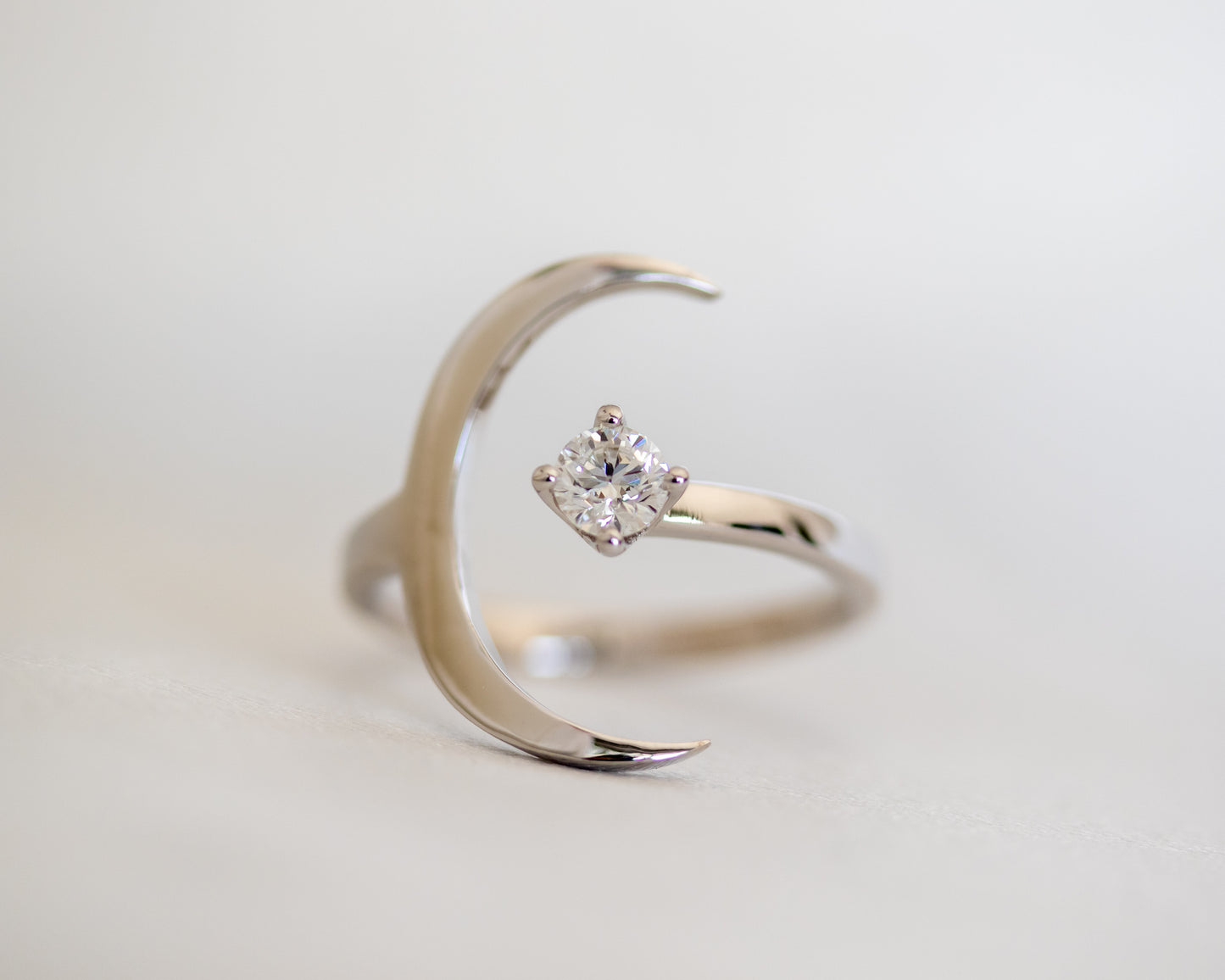 Crescent moon diamond engagement ring in solid gold