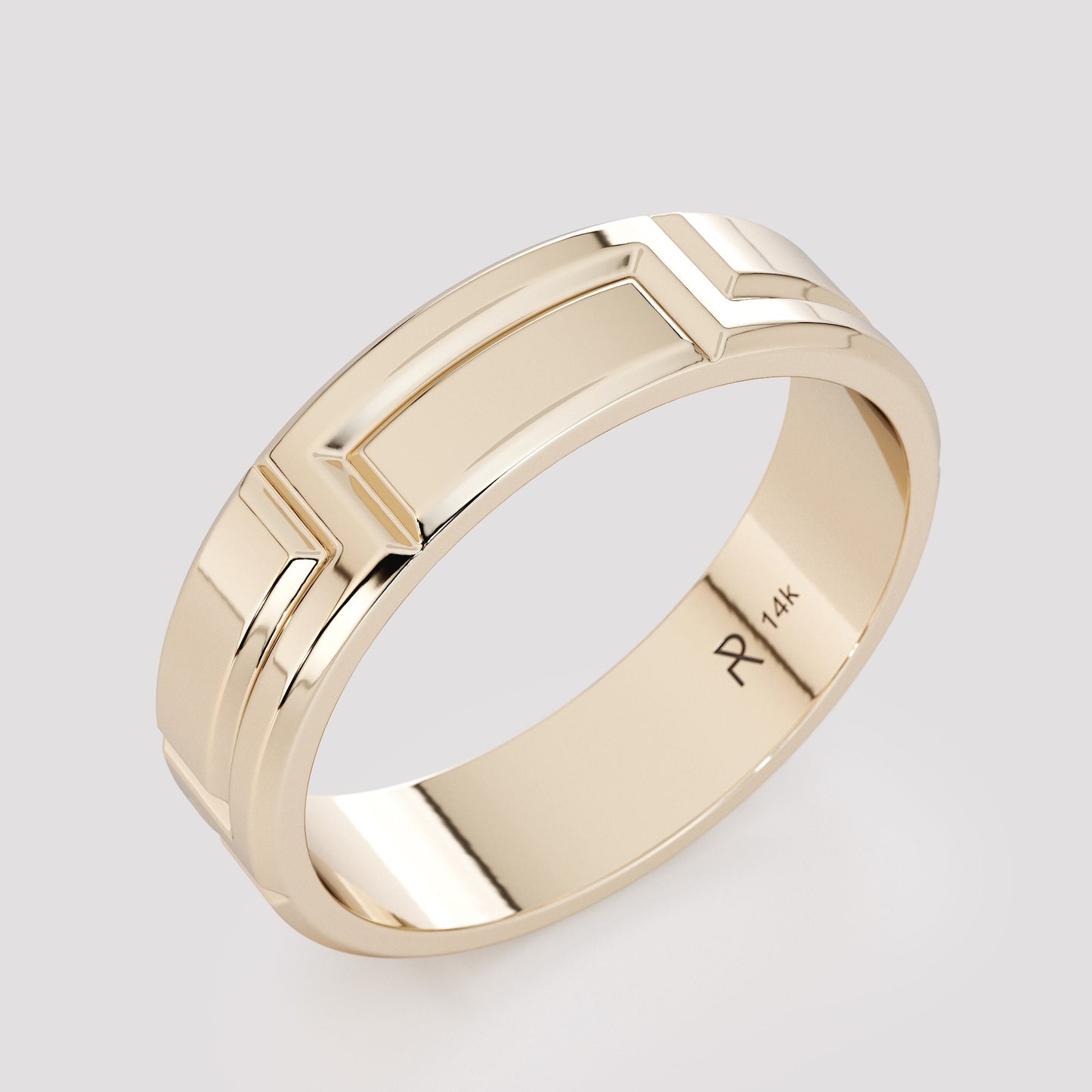 gold geometric carved ring in blue velvet box