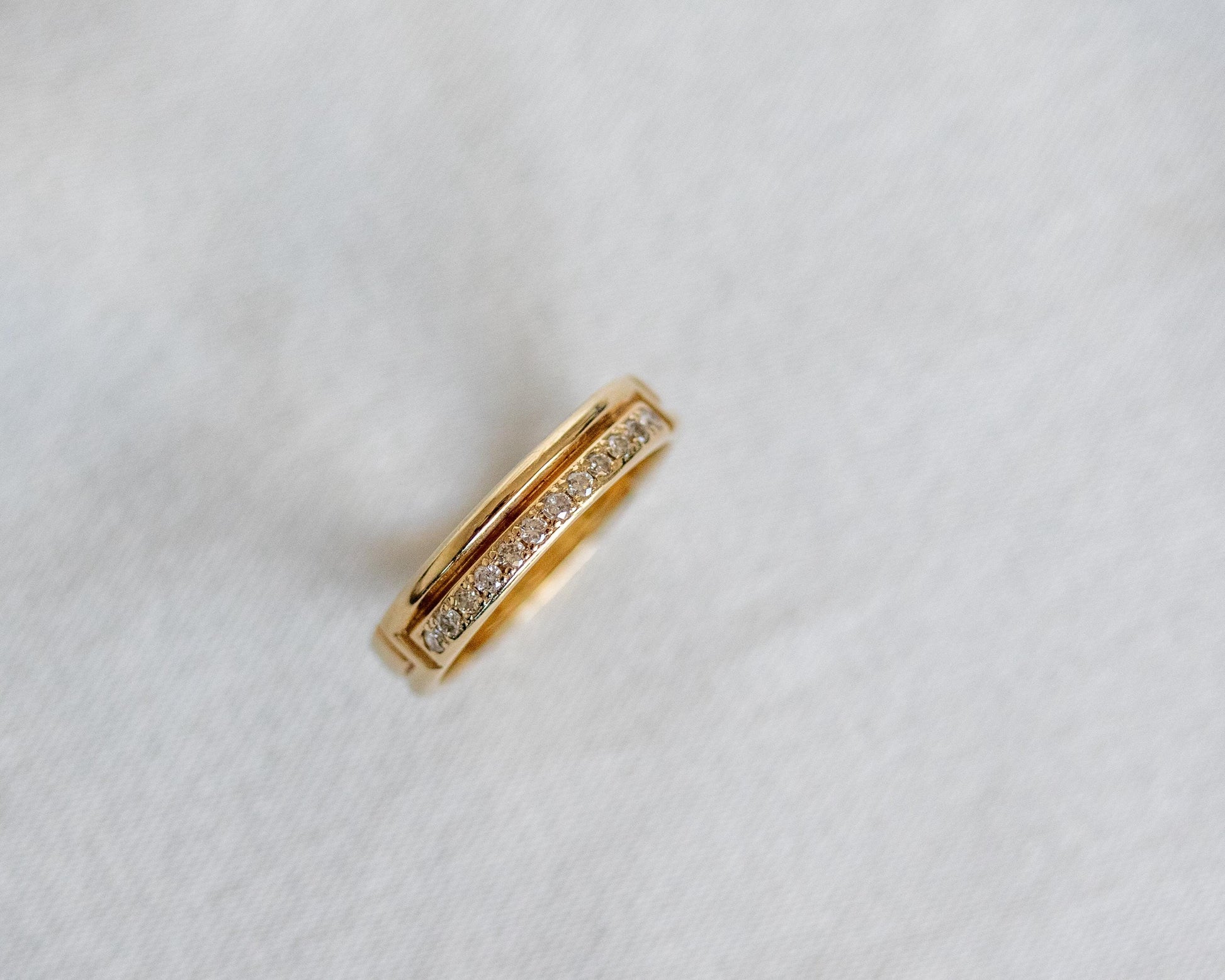 gold ring diamond detail close up texture