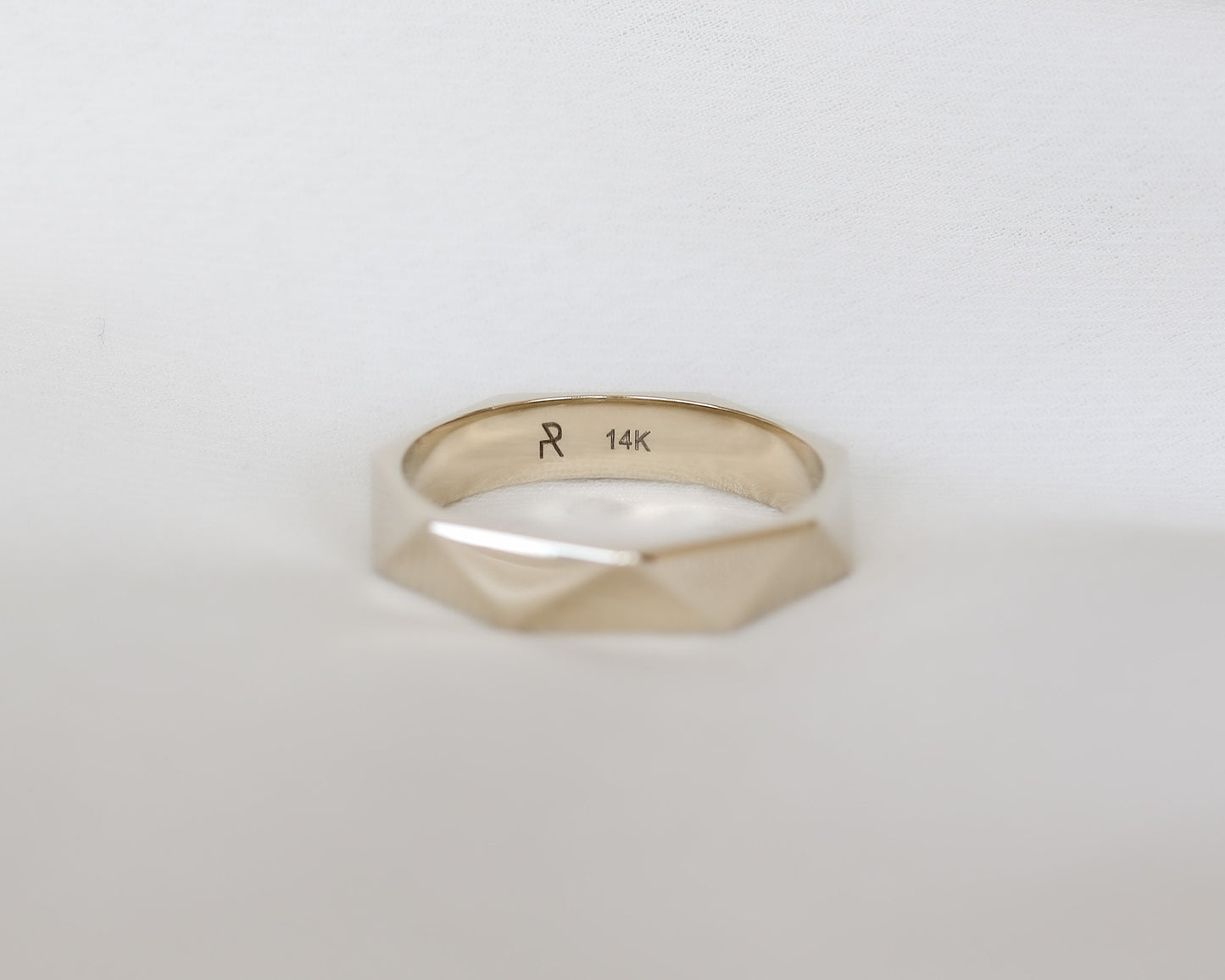 gold ring interior engraving detail close up