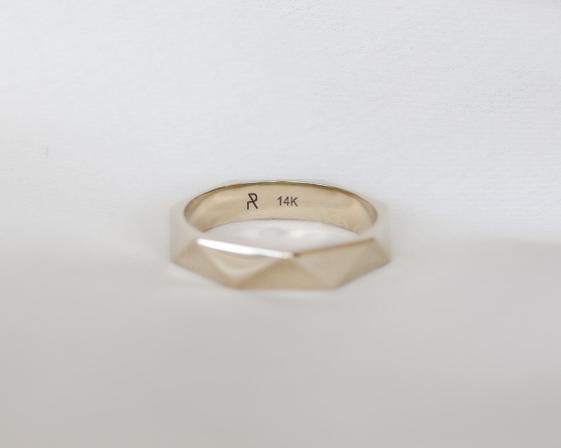 gold ring interior engraving detail close up