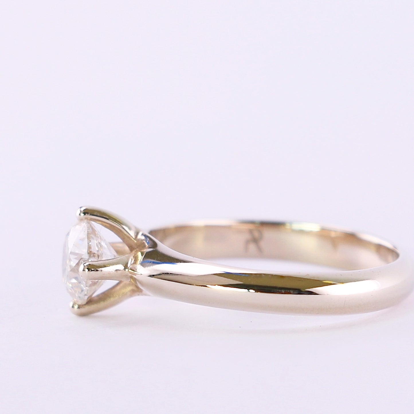 white gold diamond solitaire ring facing side