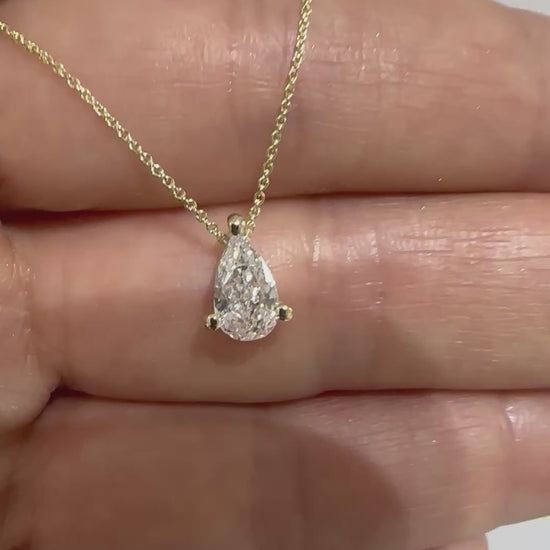 pear diamond pendant 14K gold chain natural diamond
File: pear-diamond-necklace-14k-gold-video