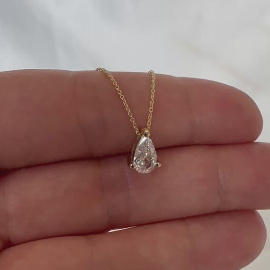 pear diamond necklace 14K gold chain natural diamond pendant
File: pear-diamond-pendant-14k-gold-video-2