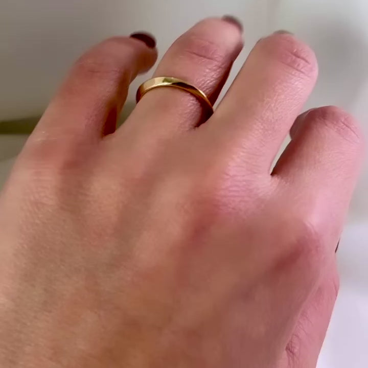 video of hand showing slim geometric ring