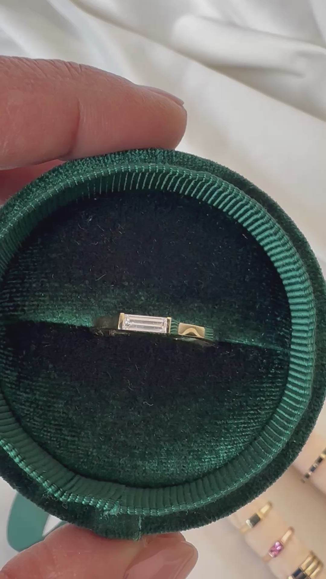 Baguette diamond ring presented in a velvet box