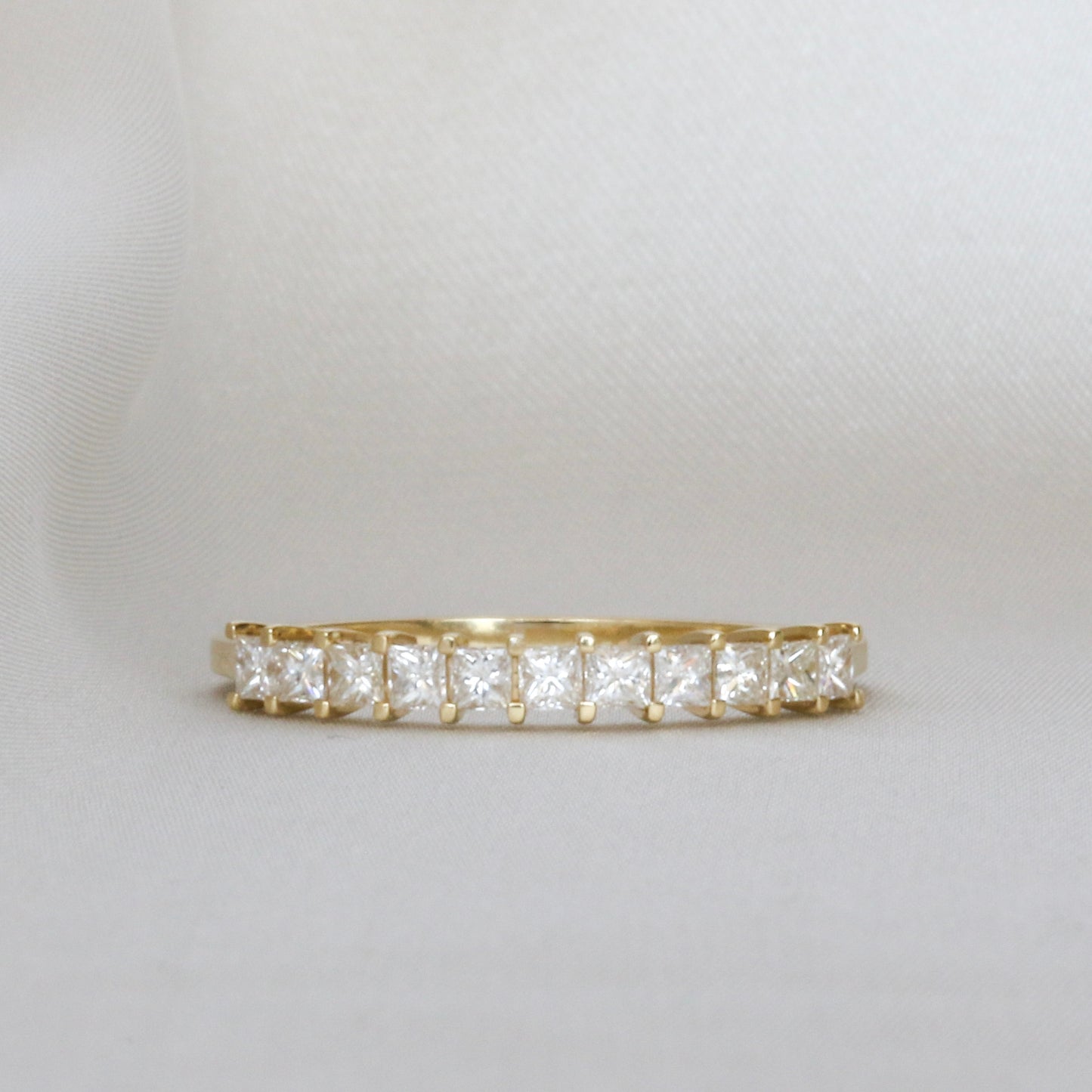 princess cut diamonds in eternity ring made from 14k gold