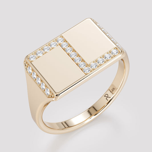 Rectangular signet ring in 14K gold pave set with natural white diamonds around the face, angled view