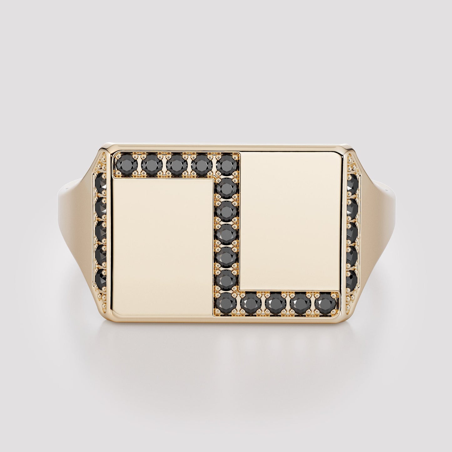 Front view of a rectangular 14K gold signet ring framed with natural black diamonds