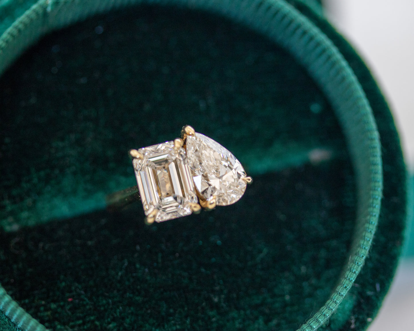 Toi et Moi two-stone diamond engagement ring in 14K yellow gold in a green velvet box