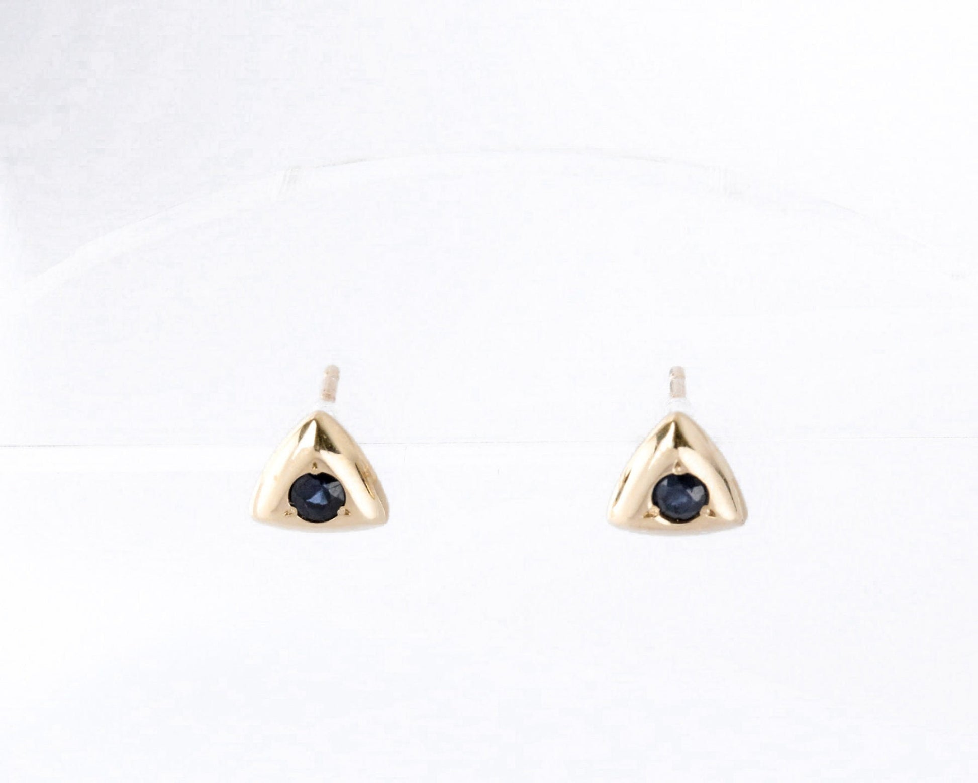 Triangular gold sapphire stud earrings in solid 14K gold