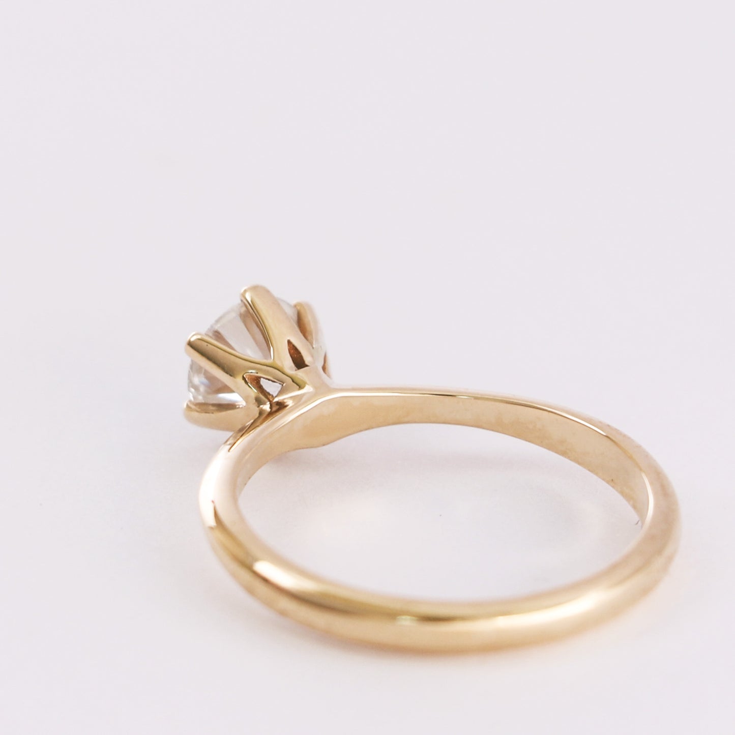 yellow gold diamond ring  facing back showing rings structure