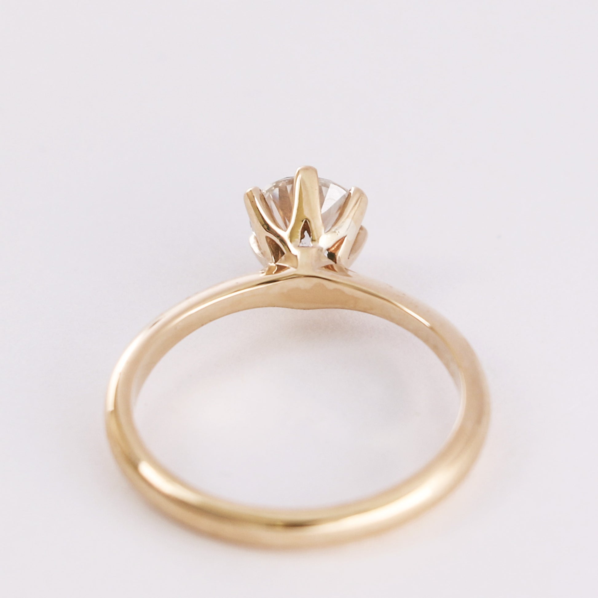 diamond ring facing back showing classic setting 